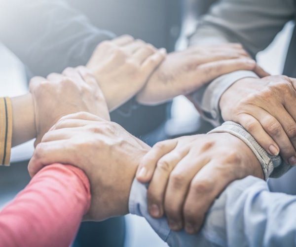 hands in stack, teamwork, integrity